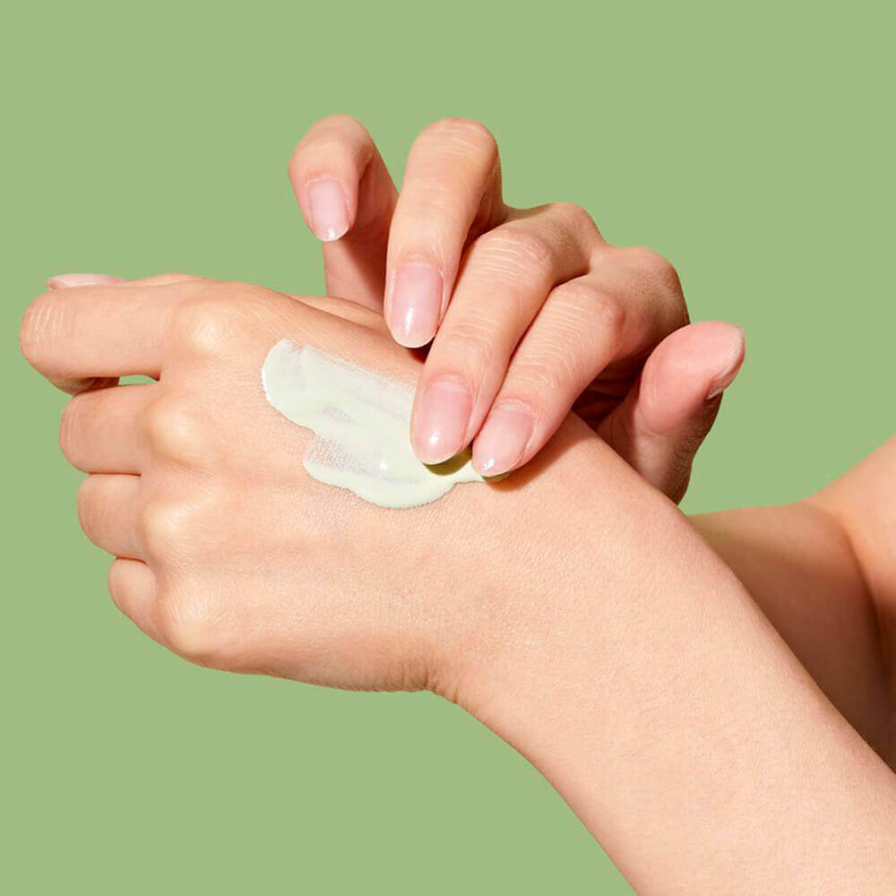 Солнцезащитный крем для проблемной кожи Dr.Ceuracle Tea Tree Purifine Green Up Sun SPF50+ PA++++