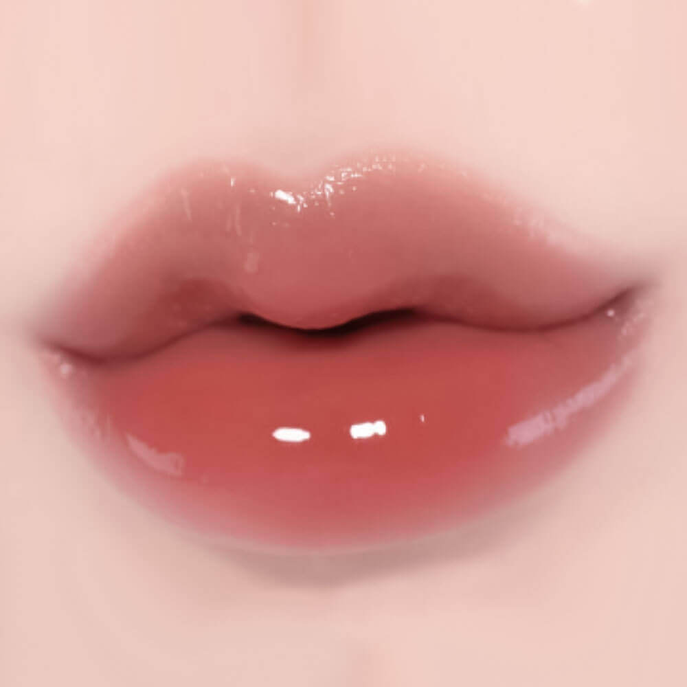 Увлажняющий 3D-блеск для объёма губ fwee 3D Voluming Gloss B06 Scotch