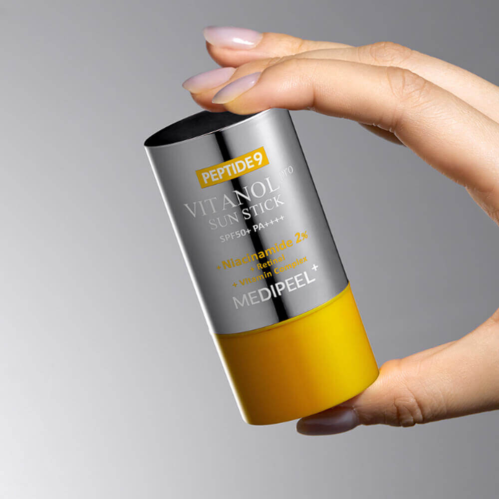 Солнцезащитный стик для выравнивания тона MEDIPEEL Peptide 9 Vitanol Sun Stick PRO SPF50+ PA++++