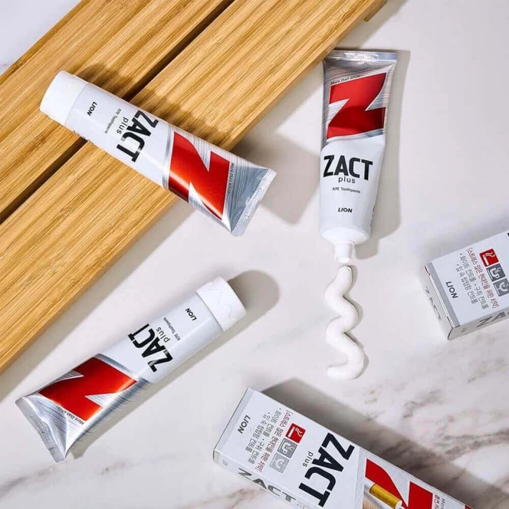 Отбеливающая зубная паста Lion Zact Plus