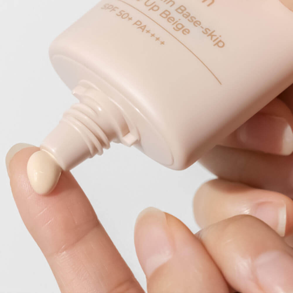 Тональная основа с защитой от солнца numbuzin No.3 Porcelain Base-skip Tone Up Beige SPF50+ PA++++