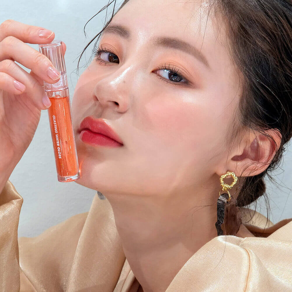 Сияющий прозрачный блеск для губ rom&nd Glasting Water Gloss