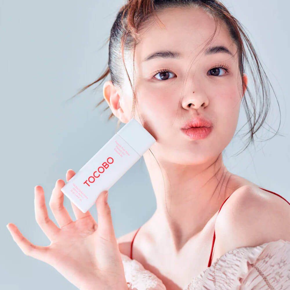 Витаминный солнцезащитный крем с тонирующим эффектом Tocobo Vita Tone Up Sun Cream SPF50+ PA++++